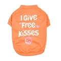Close-up of bright orange summer pet t-shirt with I Give FREE Kisses print and heart motif - Orange Free Kiss