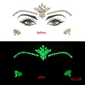 Detailed comparison of glowing Halloween face jewels in day and night views - YJ-24