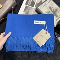 Klein blue cashmere-feel scarf with fringes and minimalist brand tag on black texture - 200x68cm / Royal Blue