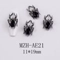 Macro shot of spider nail jewelry with gunmetal finish and black droplet zircon 11x19mm - Large Black Zircon Spider (AE21)
