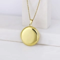 Polished gold round photo locket necklace for couples on a marble surface - Round Smooth 20*20/Gold