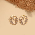 Gold monstera leaf earrings with micro-pave purple zircons and minimalist design - Purple