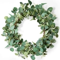 Close-up of artificial eucalyptus wreath with white berries on a natural vine base - RFW23004-Eucalyptus Round Leaves White Buds