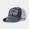 Detail of vintage gray trucker hat with Barn Hair don't Care embroidery and mesh back - Adjustable / Dark Grey Barn Hair Pink