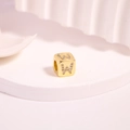 Golden cube charm with letter W and micro-set cubic zirconia for DIY jewelry - Letter W