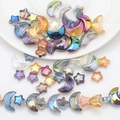 Close-up of iridescent AB color moon and star glass beads for DIY jewelry making - Random Mixed Electroplated Colors