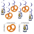 Oktoberfest hanging swirls with orange pretzels and blue beer mug cutouts for festival decor - Hanging Swirls Decorations
