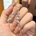 Bracelet à perles argenté avec un pendentif Hello Kitty scintillant et breloque fleur - Style Chat Dessin Animé Creux Fleurs de Pêcher