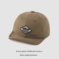Detail of baby soft brim baseball cap with vintage mountain patch on cotton fabric - One Size / Dark Coffee