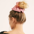 Pink satin oversized scrunchie showing soft fabric texture and elegant hair styling - Pink