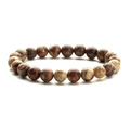 Macro view of red-brown and beige natural stone beads on an elastic bracelet - Yellow Floral
