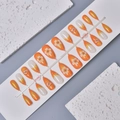French almond press-on nails with orange gradient and 3D white floral decorations - Orange and White Gradient Relief Floral Style (WY-059) / 24 Pieces Strip Pack