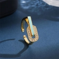 Detail of light blue enamel and sparkling rhinestones on an adjustable golden ring - Button Ring [Light Green]