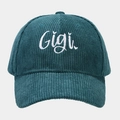 Close-up of white Gigi embroidery on dark green corduroy baseball cap texture - Adjustable / Malachite green