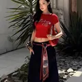 Detail of red silk scarf belt with tassel and fringe on black skirt outfit - 2# Red
