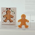 Gingerbread man scented candle in warm brown with decorative packaging box - Solid Color Gingerbread Man