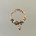 Adjustable rose gold wire bracelet with colorful crystal beads and rose pendant charm - Rose