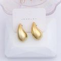 Polished gold drop earrings for women displayed on a jewelry card with a stylish design - Mirror Gold