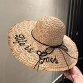 Straw sun hat in khaki with Life is Good embroidery and black ribbon bow detail - Khaki Embroidered Hat
