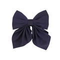 Close-up of deep purple matte fabric bow hair clip with textured weave detail - Deep purple