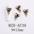 Detail of 9x13mm gold heart nail charms with black gemstone for DIY manicure art - AF39-Gold Edge Black Square Gem Heart