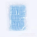 Blue disposable non-woven headband for spa and beauty salon use in clear packaging - 100pcs/pack / Blue