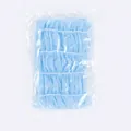 Blaues Einweg-Stirnband aus Vliesstoff für Spa und Friseursalon in Klarsichtverpackung - 100 Stück/Packung / Blau