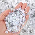 Close-up of mixed white and AB resin pearls and rhinestones for DIY nail art and crafts - Half-round Pearl Mixed With Gray And Pure White Ab Series-h / 30 g