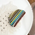 Bohemian acrylic hair claw with colorful geometric polka dots and wave patterns - Striped Yellow Blue