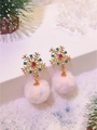 Close-up of snowflake Christmas earrings with rhinestones and pink pom poms detail - Pink Snowflake Pom-pom