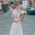 Elegante witte trouwjurk met lange mouwen, bloemenkant lijfje en gelaagde tule rok - US Maat 2 (S) / Wit