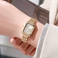 Close-up of elegant gold square quartz watch with metal link strap on a model wrist - Gold Color White