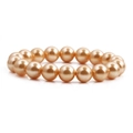 Classic 10mm champagne gold shell pearl bracelet with a high gloss finish on white background - Yellow