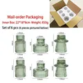 6-piece green ribbed glass candle holder set in various shapes for home decor - Large Combination Set / Green