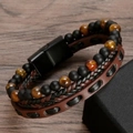 Detail view of multi-layer leather bracelet with tiger eye beads and black magnetic clasp - Tiger Eye & Matte Black Stone Style / Brown