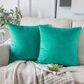 Set of two turquoise velvet square pillow covers on a beige sofa in a cozy home setting - 51# Turquoise / 40*40cm
