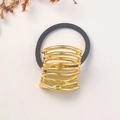 Fashionable gold-finished twisted metal hair tie with black elastic band on white background - Gold Irregular Twisted Buckle