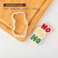Tagliabiscotti bianco con lettere HOHOHO per Natale dimensioni 4,9x8,3 cm - Tagliabiscotti HOHOHO / 4.9x8.3cm