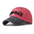Detailansicht einer verwaschenen Baseballkappe mit Miami Beach Bestickung im Vintage-Look - Fuchsia