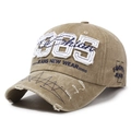 Khaki distressed baseball cap with 1985 embroidery and washed cotton finish - Khaki