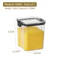 Τετράγωνο διαφανές βάζο τροφίμων 700ml με μαύρο καπάκι και κίτρινο κεχρί στο εσωτερικό του - Μεσαίο 700ml