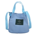 Piccola borsa a secchiello in tela blu nebbia con manici intrecciati e tracolla regolabile - Azzurro