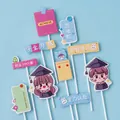 10-piece set of graduation cake toppers with inspirational slogans in pastel colors - Graduation Go For It Duck 10 Sets