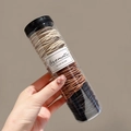 Brown gradient high-elastic hair ties in a clear cylindrical pack with brand label - Autumn Colors (100 Pcs/Can)