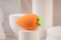 Carrot shaped orange makeup sponge blender with green leaf top on professional stand - Dark Orange Carrot