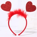 Detail view of red sequin hearts and soft feathers on a flexible holiday headband - Style 13 Laser Cut Heart (Sequin Feather)