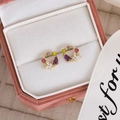 Macro detail of multicolored floral zircon earrings in a premium pink velvet jewelry box - 23# Luxury Colorful Gemstone Wreath