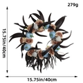 Gothic Halloween moon cat wreath with black leaves, blue pumpkins, and grey skull decor - Pumpkin Skeleton Wreath