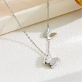 Minimalist silver butterfly necklace with dual matte and polished pendants on book - X909 Butterfly Necklace Silver