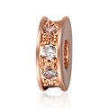 Macro shot of rose gold plated spacer beads with inlaid clear zircon for DIY jewelry - Rose Gold + White Zirconia